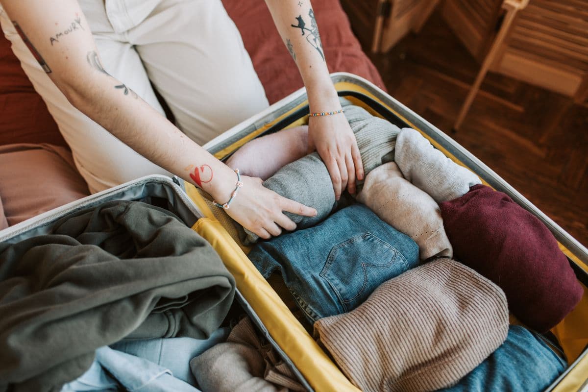 Packing clothes and accessories into a carry-on