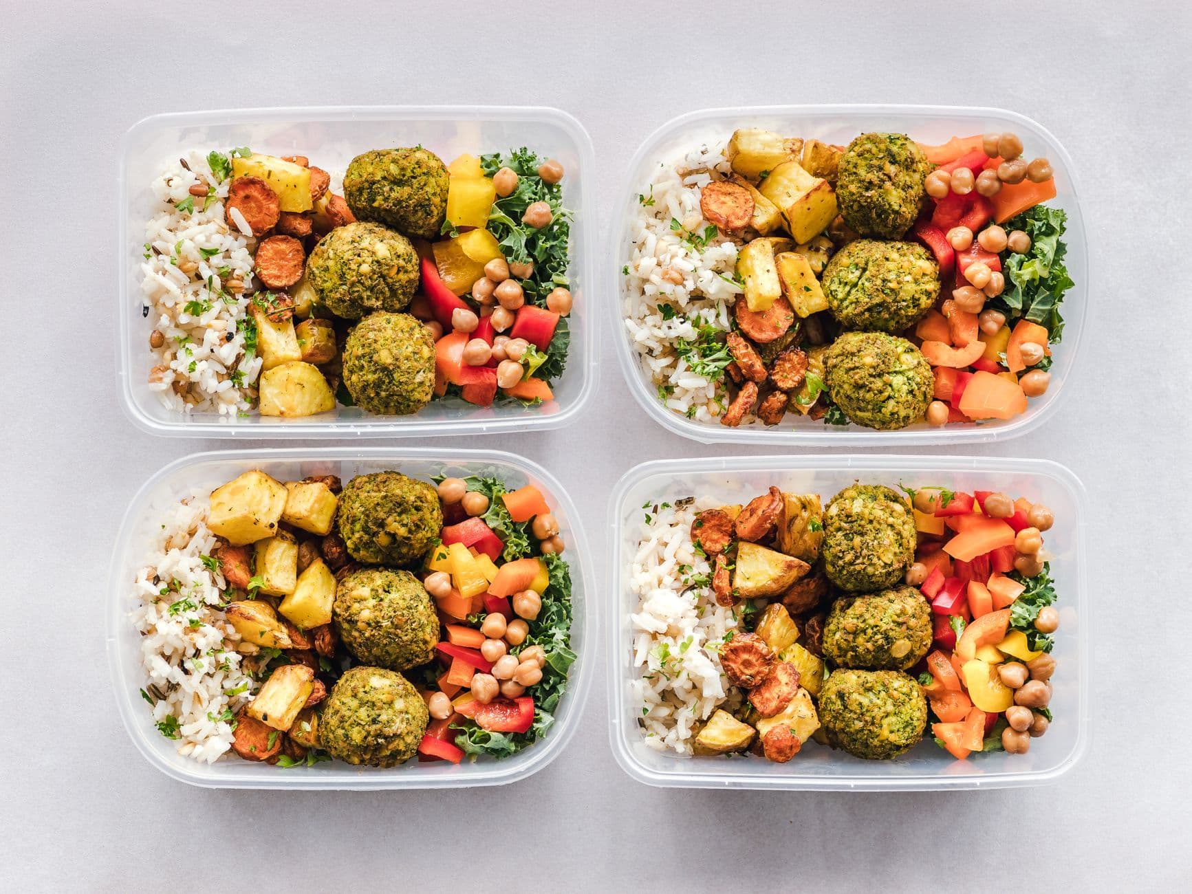 Make-ahead meals portioned into containers, ready to pack for a trip
