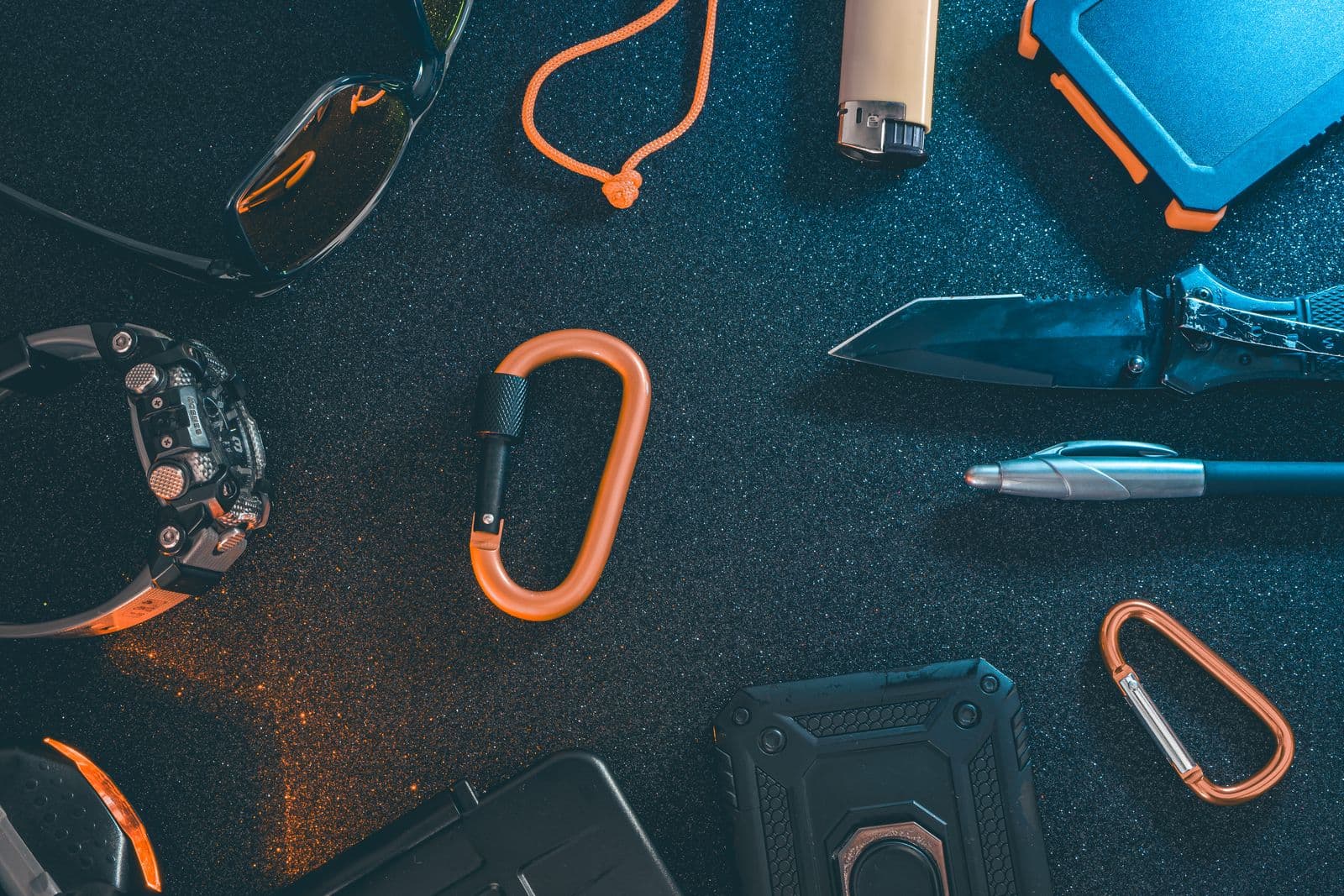 A curated flat lay of outdoor gear and adventure essentials