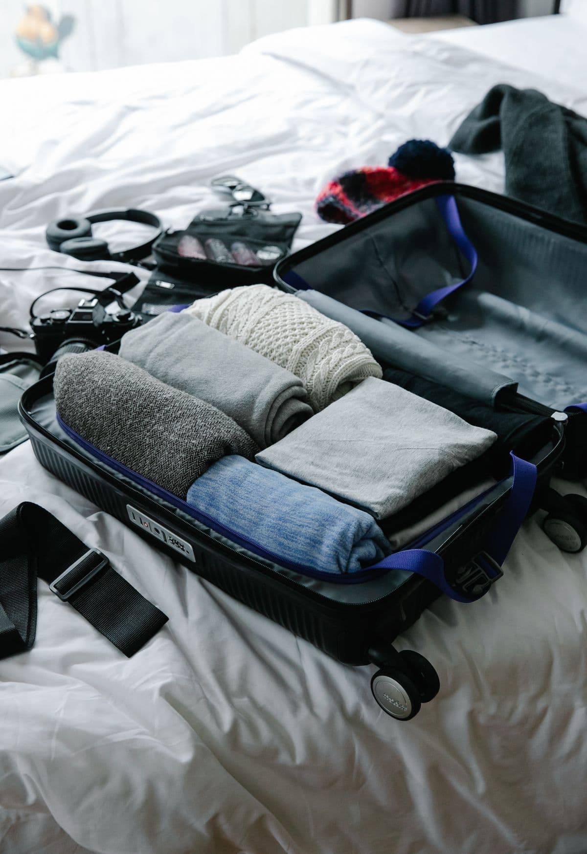 Open suitcases being packed for travel